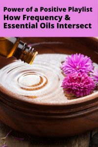 bowl of essential oils and pink flowers